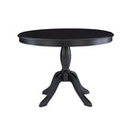 Table ronde à pied central en bois massif