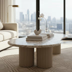 Table basse avec plateau en marbre de forme galet