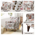 Fauteuil en bois traditionnel Araceli, rembourré à motifs floraux, avec dossier à oreilles et garniture cloutée | ART OF LIVING DESIGNS