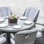 Ensemble de salle à manger rond 7 pièces en rotin tressé d'extérieur avec coussins par Moda Furnishings