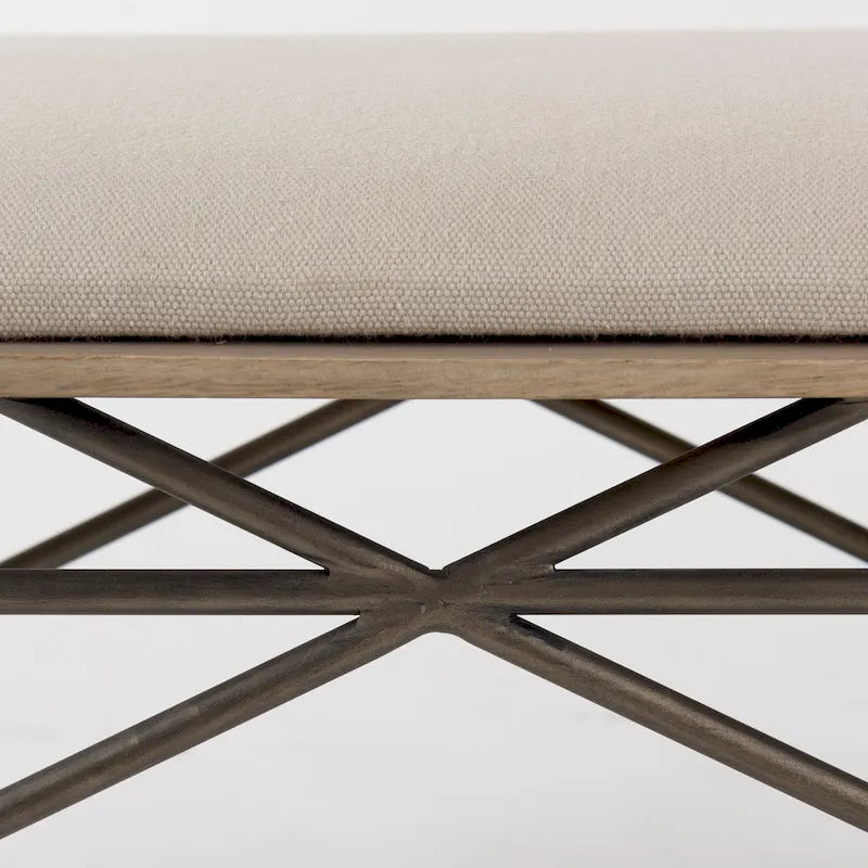 Banc Camille avec assise en tissu crème et structure en métal foncé – 55,5 larg. x 16 prof. x 17 haut.