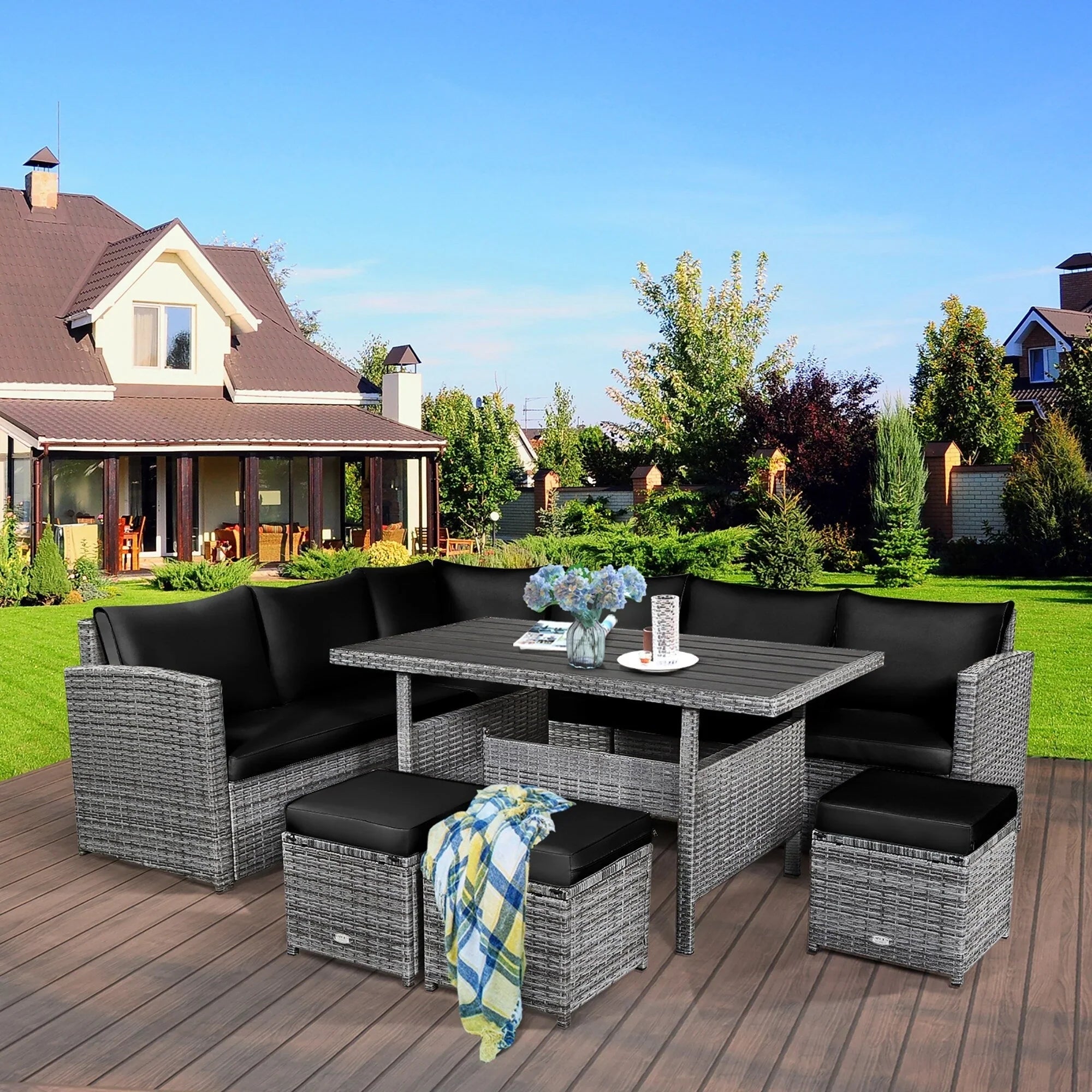 Ensemble de salle à manger Costway 7 pièces en rotin pour terrasse, canapé sectionnel et pouf - Voir détails