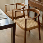 Chaise de salle à manger scandinave incurvée en bois tressé avec accoudoirs